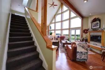 The Great Room has 15 windows looking out at the Pacific Ocean. Propane fireplace adds warmth and coziness. Ceiling lights throughout the home, all rheostat controlled. Ceiling fan is at the peak of the 25ft ceiling.