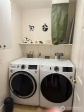 Laundry Room. newer GE washer and dryer. Laundry chute from primary bedroom.