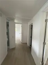 Hallway to back bedrooms and laundry