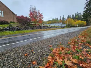 Standing at entrance of driveway, looking to road. Church is across the street.