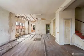 The home's original architecture is charming. Use caution walking on the buckled floors.