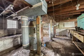 A different view of the unfinished basement.