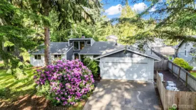 Serene home in Long Lake Estates with 2 car garage.