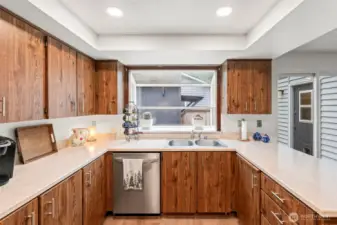 Stainless appliances and updated countertops create a joyful cooking experience.