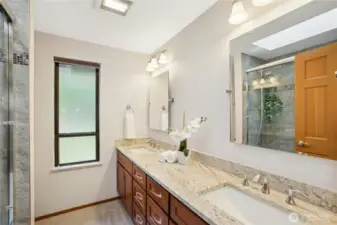 Large main bathroom w/ quartz countertops, undermount sinks, and heated floors!