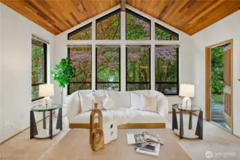 Exit the living room to your own private park-like yard and deck outside