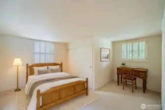 Second upstairs bedroom. Photo is virtually staged.