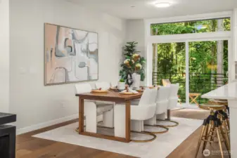 You can comfortably fit a 8-10 person dining room table.