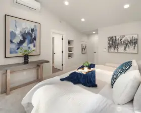 Primary suite with built in book shelf.
