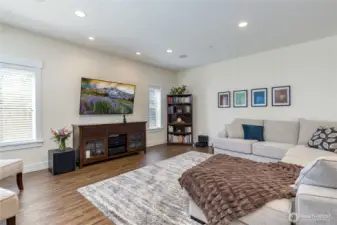 Living/great room with surround sound speaker system