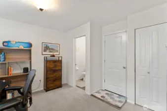 door leads to garage with an EV charger