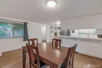 Large picture window allows natural light to flow throughout the open floor plan.