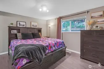 Primary bedroom suite offers a neutral color palate to go with any decor.