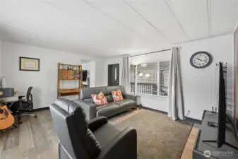 A view of the entry through the living room.