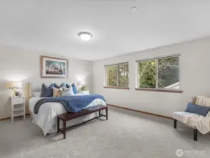 The primary suite is all about scale and serenity. Large enough for king size set and still plenty of "breathing room"