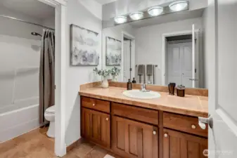 Upper full bath with new sink and faucet