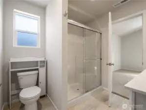 The en suite has a double size walk-in shower providing a spa-like experience.