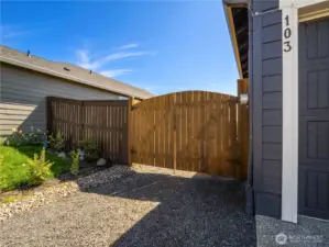 Convenient double gate provides access to the side yard and backyard. Perfect for parking big toys out of site.