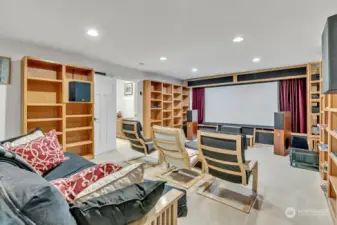 Don't miss the fantastic movie room with automated screen, built in shelving and high end movie system