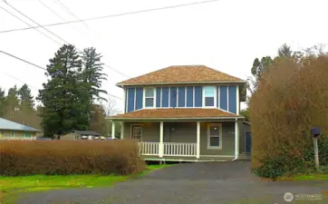 Lovely remodeled 2-story farmhouse on a corner lot.