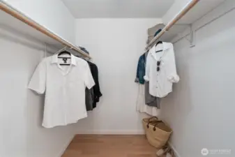 Primary bedroom walk-in closet