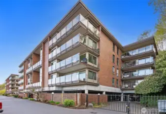 Harbor Park has been updated with glass deck-railing to maximize the views! The covered parking space and storage for our unit is just past this gate.