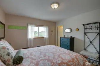 Main bedroom with the door leading to the bathroom.