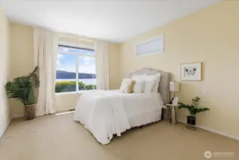 Gracious primary suite with sparkling water views!