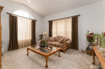 Formal living room with lots of light