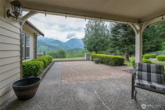 Covered patio boasts mountain views