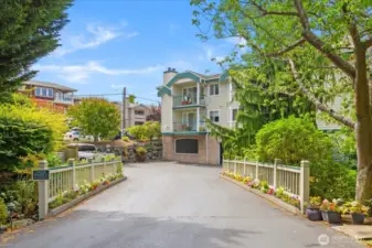 Secure gated garage entrance. 2 side by side parking spaces assigned to the unit