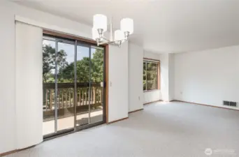 Sliding door extends the living space onto a private balcony—perfect for morning coffee or evening relaxation.