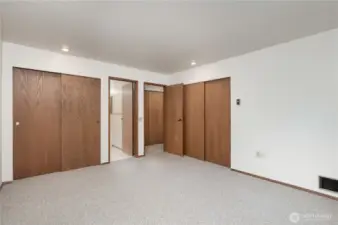 Welcome to the primary with dual closets.