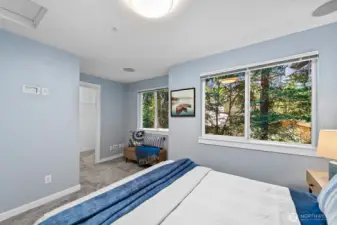 Bright bedrooms with large windows and walk in closet