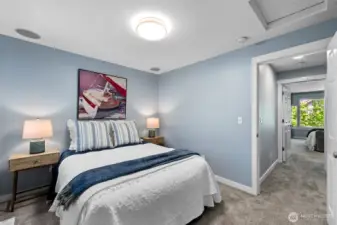 Light-filled bedroom with lots of storage
