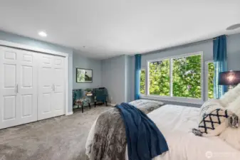 Spacious primary suite with abundant natural light