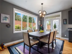 Dine with a view of the back yard and patio.