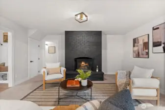 Cozy bonus living space highlighted by a wood-burning fireplace.