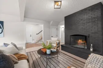 Bonus living area with wood-burning fireplace and adjacent bedroom/bath.