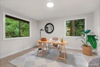 Upstairs bonus room adaptable for office, bedroom, or exercise.