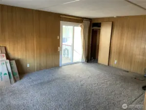 Livingroom with sliding glass door to porch