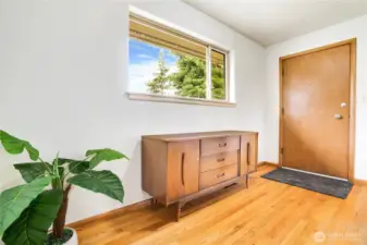 Step into a light-filled entry with gleaming hardwood floors and updated windows that add modern comfort and charm. With five bedrooms and room to grow, this home offers the space and flexibility to fit your lifestyle perfectly.