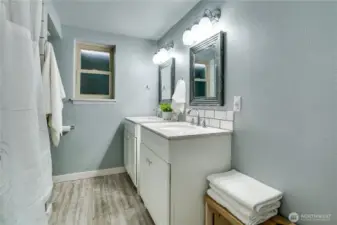Fully updated in 2017, this full bathroom refresh included two new vanities, modern lighting and luxury vinyl plank flooring. Get your own at-home spa experience!