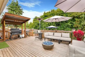 From impromptu cookouts to sunset chats, this spacious deck is an extension of your main living space, complete with a covered BBQ zone built for everyday joy.