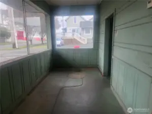 End of showroom and entrance to two bathrooms