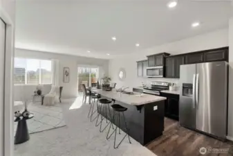 Enter to great room w/ plenty of kitchen spaces