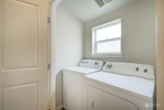 Laundry room on top floor off double master suites