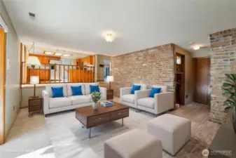 Family Room w/Beautiful Brick Wall Virtually Staged