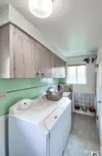 Laundry room with 3/4 bath off to the right.