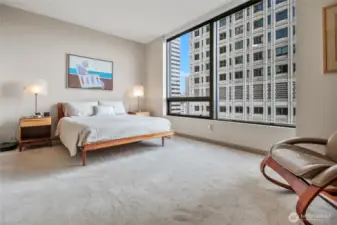 The first of two sleeping spaces; this is the primary and includes an ensuite bathroom and an enormous closet.